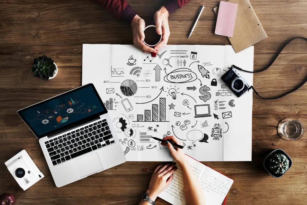 North Ember consultants collaborating with clients over coffee, symbolizing strategic partnership and mission-driven business growth.